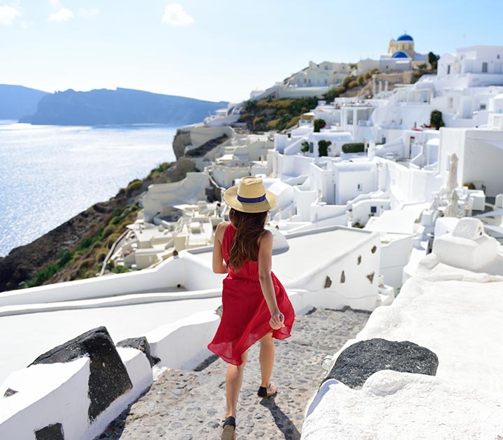 girl-walking in Oia Village, Santorini